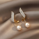 Cosette | Boucles d'oreilles en perles de cristal et plumes