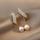 Cosette | Boucles d'oreilles en perles de cristal et plumes