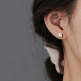 Alizée | Boucles d'oreilles pendantes en perles d'eau douce élégantes